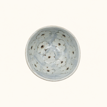 Bowl with floral pattern on white background