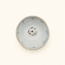 Bowl with floral pattern on white background
