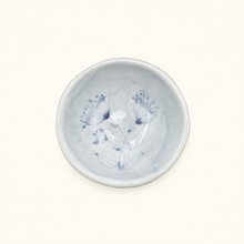 Spako Clay ceramic dish with blue floral pattern on a white background
