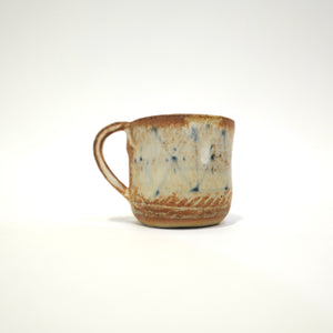 Spako Clay Espresso Cup blue and white glaze. Geometric Pattern. Handle on left