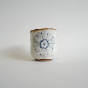 Spako Clay Wide Tumbler single blue flower on white glaze
