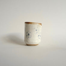 Spako Clay Wine/tea cup Multiple Blue Flowers on white glaze