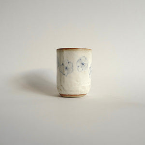 Spako Clay Wine/tea cup Multiple Blue Flowers on white glaze