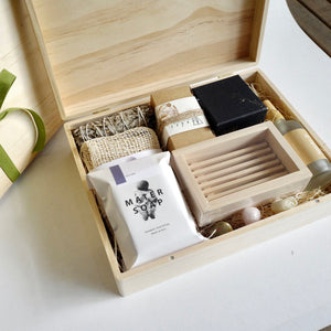 A selection of products in a the Ritual Wellness Gift Box