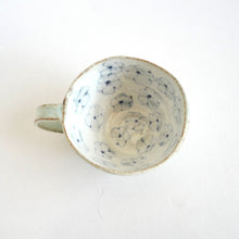 Spako Clay Cappuccino Mug blue floral drawing, white glaze