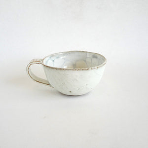 Spako Clay Cappuccino Mug blue floral drawing, white glaze