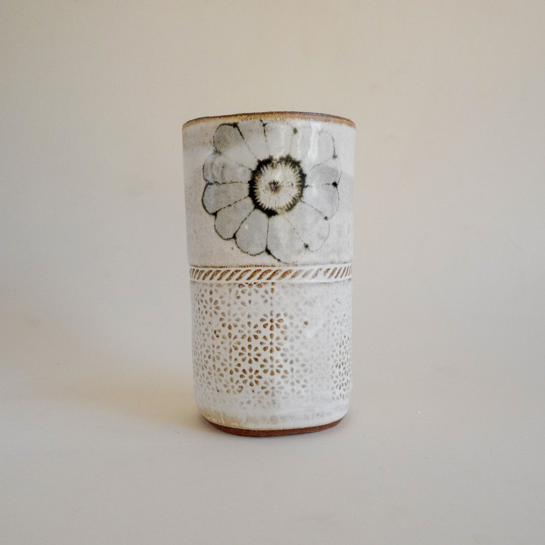 Spako Clay vase single flower and textile texture