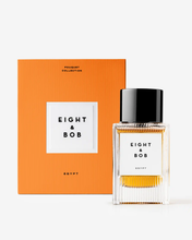 Perfume bottle and packaging with 'Eight & Bob' branding on a white background