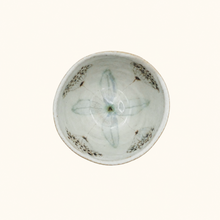 Bowl with floral pattern on white background