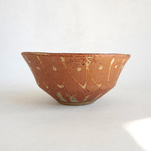 Ceramic bowl with geometric design on a white background