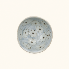 Bowl with floral pattern on white background