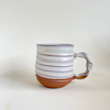 Bulbous , grooved Ceramic Mug In Cream Color Glaze