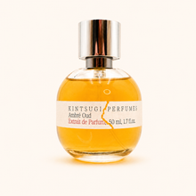 Kintsugi Perfume bottle with label on a white background