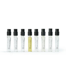 Set of Kintsugi Perfume sample bottles on a white background