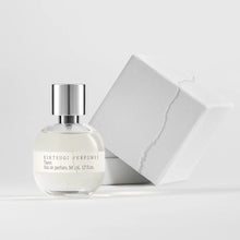 Perfume bottle and box on white background