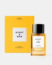 Eight & Bob perfume bottle with yellow packaging on a white background