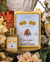 L.T. Piver Cuir de Russie eau de parfum with decorative box on a floral background