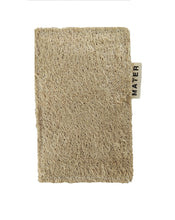 Textured beige sponge with 'Mater' branding on a white background
