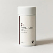 A white cylindrical canister of Morihata Vabukita green tea on a light gray background.