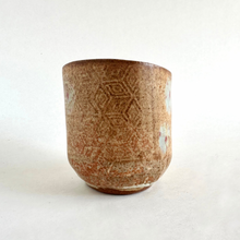 Spako Clay Wide Tumbler 5 burnt orange glaze multi floral pattern back