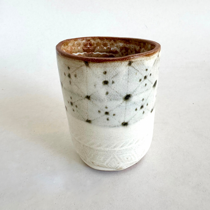 white glaze green geometric pattern