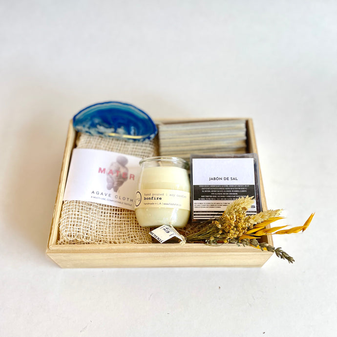 Wood box holding items included in the bath gift set