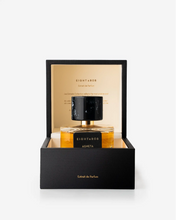 Perfume bottle in a black and gold box with 'Eight & Bob' branding.