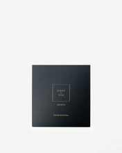 Eight & Bob Black box with gold text on a white background
