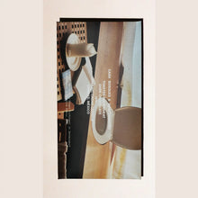 Chocolate package label against a beige background