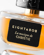 Perfume bottle with 'Eight & Bob' label on a white background