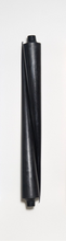 Set of black cone taper candles on a white background