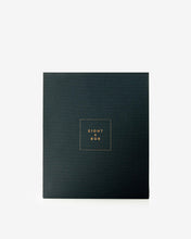 Black square box with 'Eight & Bob' branding on a white background