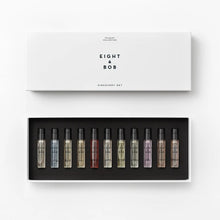 Set of small Eight & Bob perfume bottles in a black box with 'Eight & Bob' branding on a white background