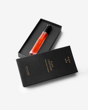 Eight & Bob perfume bottle in a black box on a white background