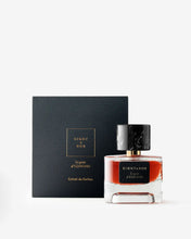 Eight & Bob perfume bottle with black cap and black box on a white background