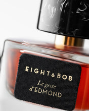 Perfume bottle with 'Eight & Bob' label on a white background