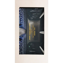 Chocolate bar packaging with image of movie theater on white backgound