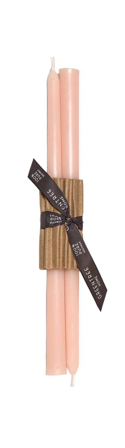 Set of two blush candles with brown ribbons and brown labels on a white background