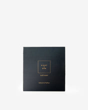 Eight & Bob Black box with gold text on a white background