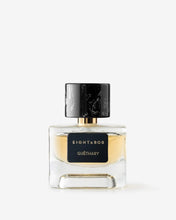 Eight & Bob Perfume bottle with black cap and gold accents on a white background