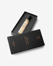Perfume bottle in a black box with 'Eight & Bob' branding on a white background