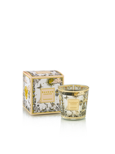 Candle with decorative box featuring floral design on a white background