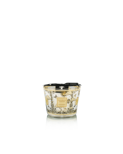 Decorative candle with intricate design on a white background