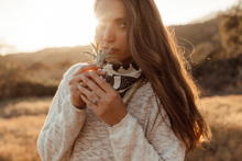 Woman wearing Bandit Bandana - "the Bloom"