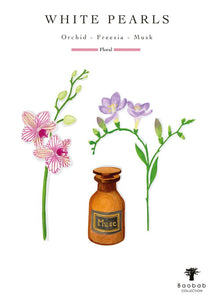Floral design with orchid, freesia, and musk bottle labeled 'White Pearls' by Baobab Collection.