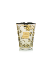 Decorative candle with intricate designs on a white background