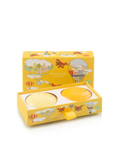 Yellow soap with airplane design packaging on a white background