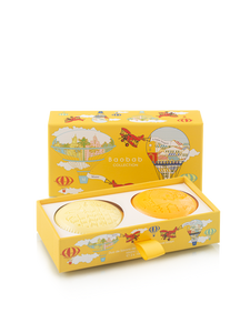 Yellow soap with airplane design packaging on a white background