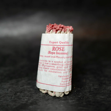 Nepali Rose Rope Incense bundle. Red dipping on each incense strand.