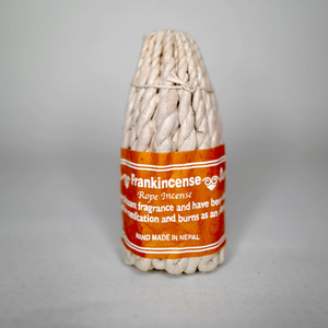 A bundle of Frankincense Rope Incense wrapped in paper packaging.